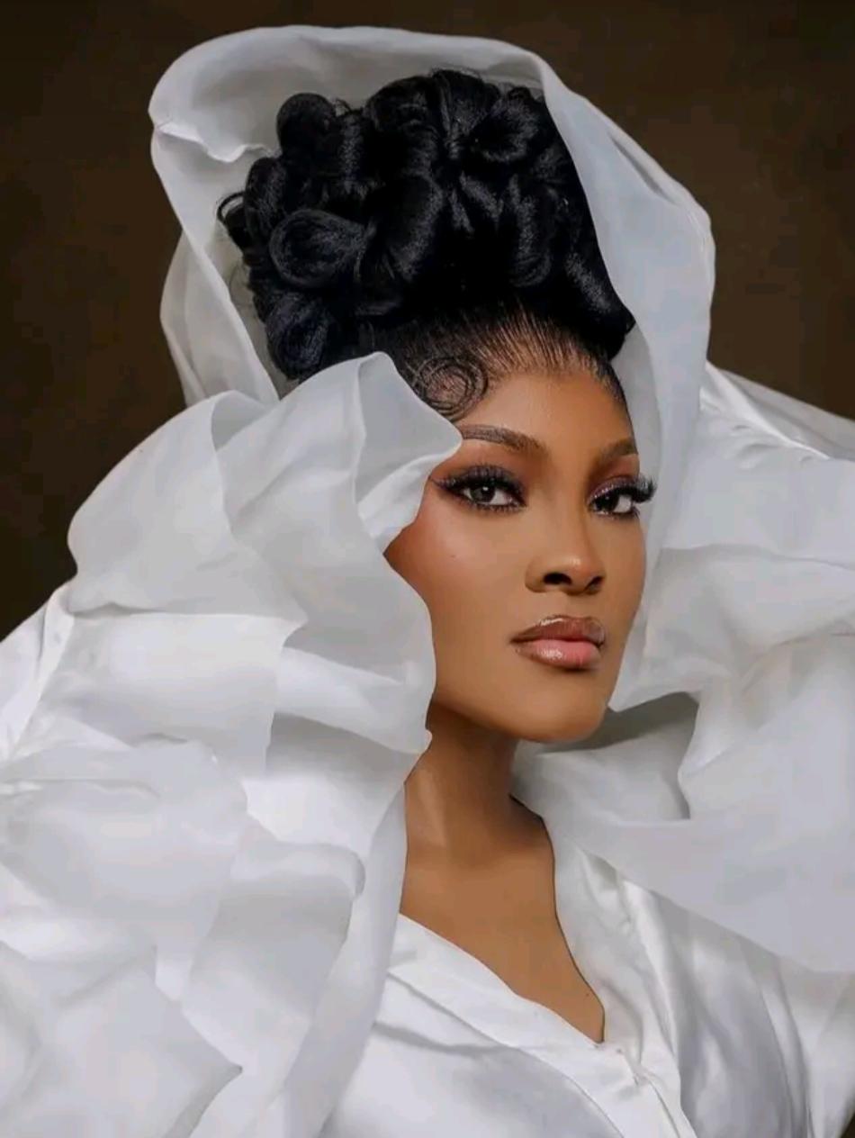 Oma Osele, Miss Continental World 2026, in a white ruffled outfit